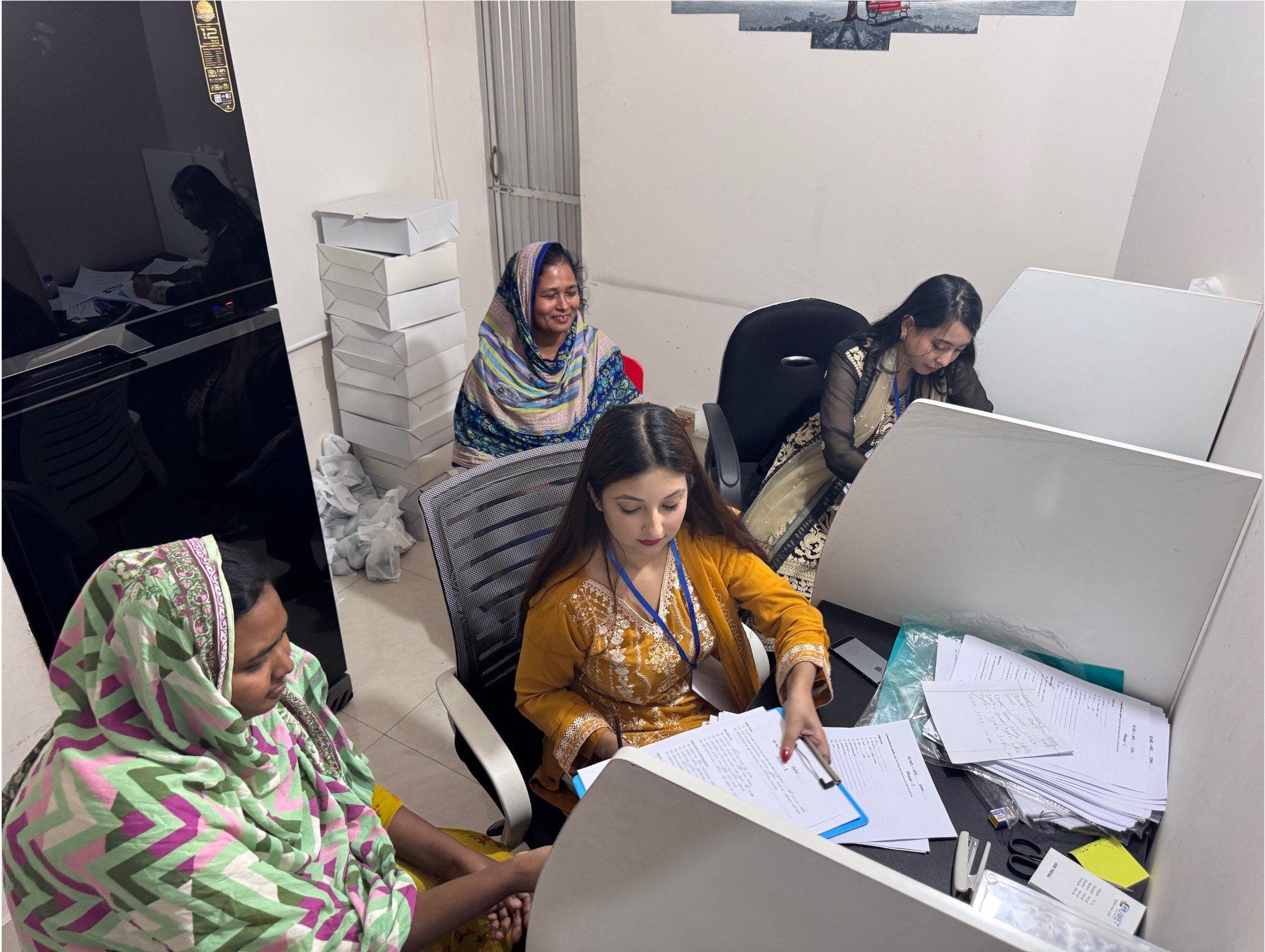 Clinical study team conducting participant questionnaire and programme administration